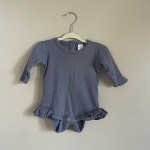 Kate Quinn ruffle onesie